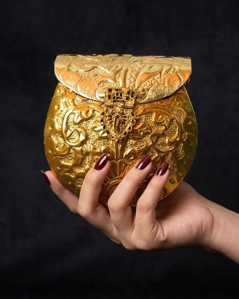 Oval Brass Clutch