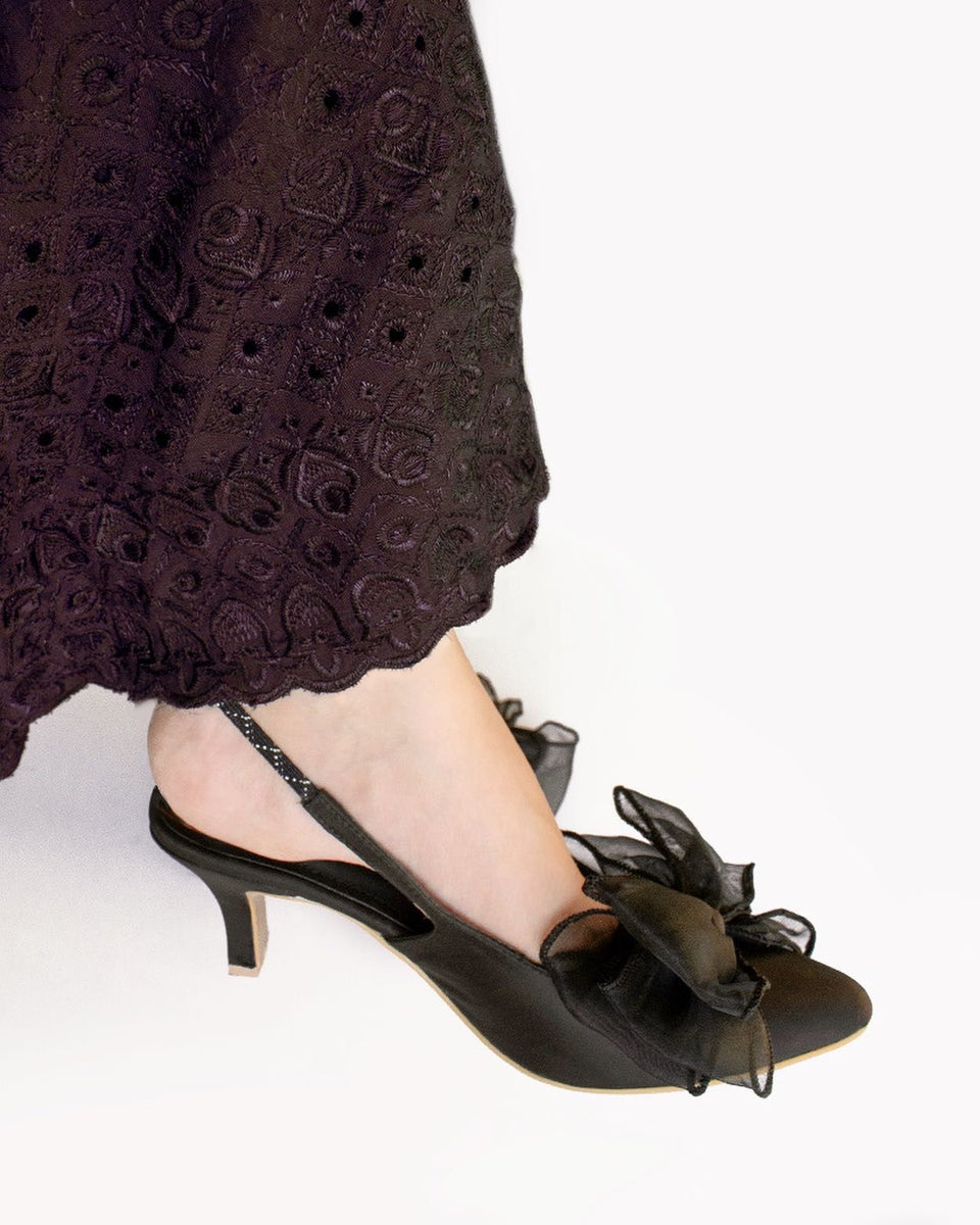 CC HEEL MULES 25S IN BLACK LAMBSKIN WITH BOW